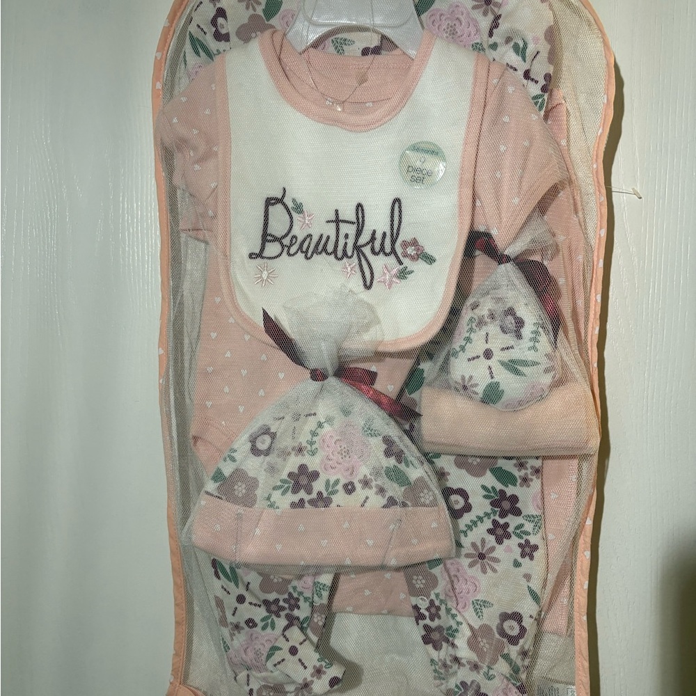 Floral Baby Outfit Set with one piece outfit, Bib and Hat, socks and more.
